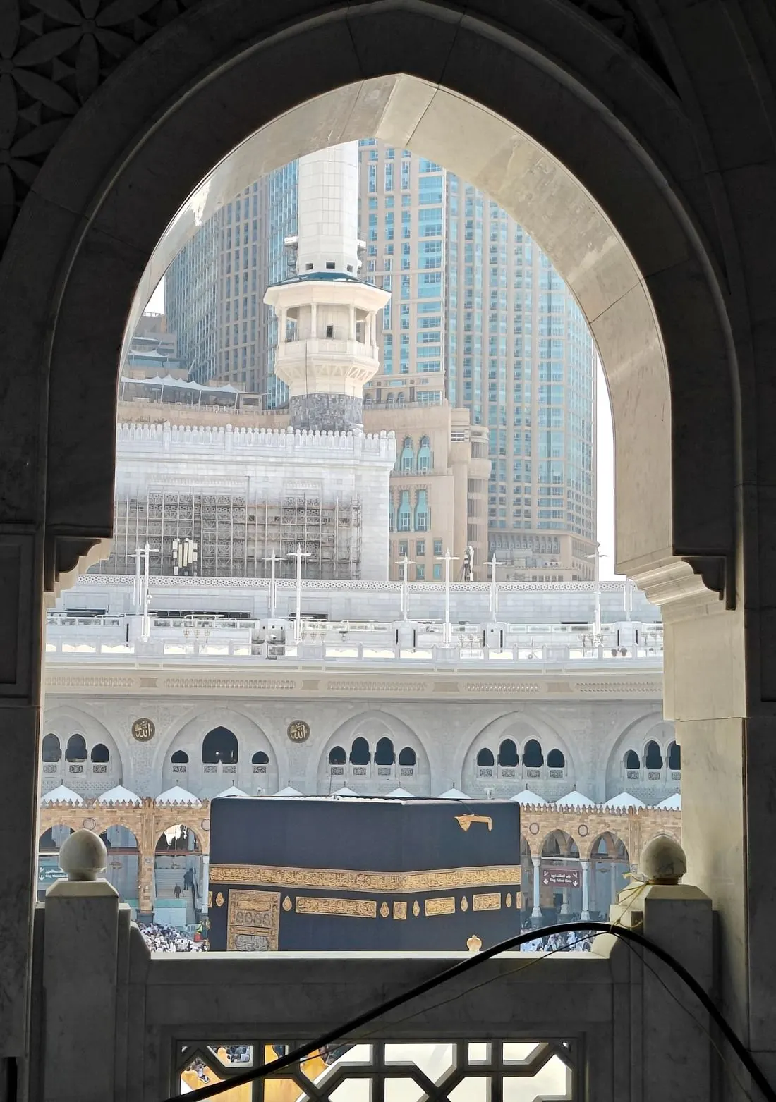 Masjid al-Haram through an arch